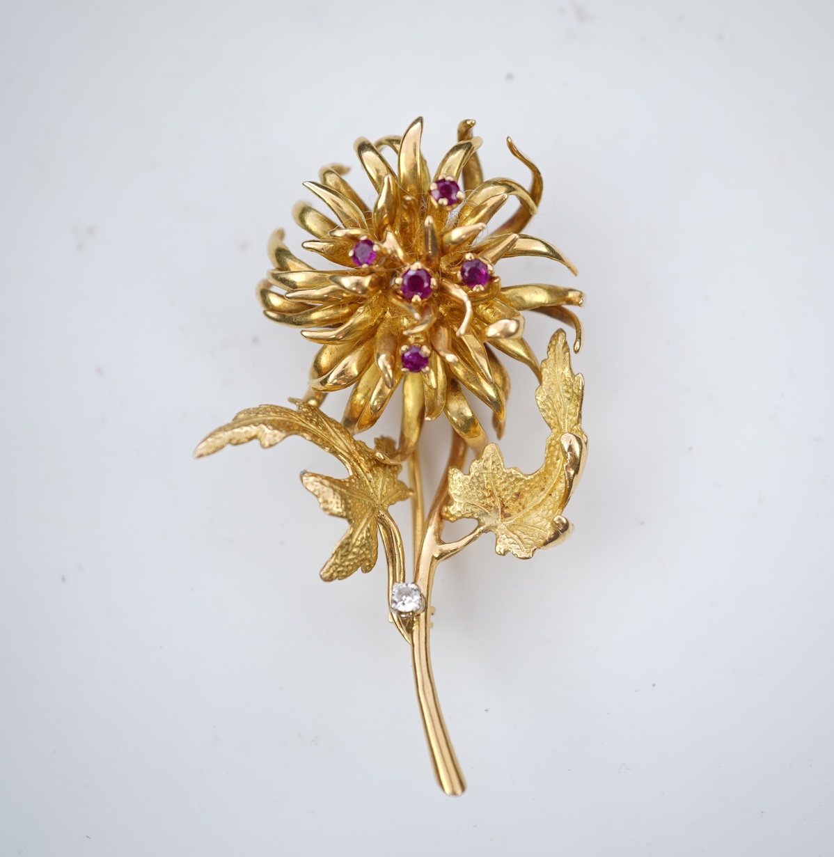 Ben Rosenfeld, a gold and ruby brooch, circa 1977